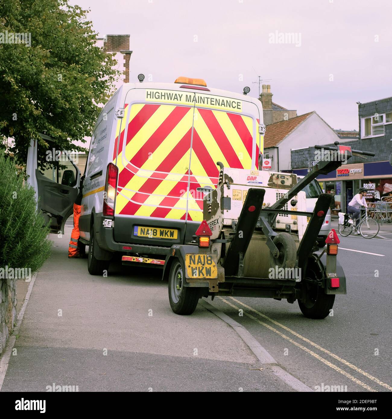 September 2018 - Work workers van obstructing a side walk pacement in the centre of the Somerset village of Cheddar, Stock Photo