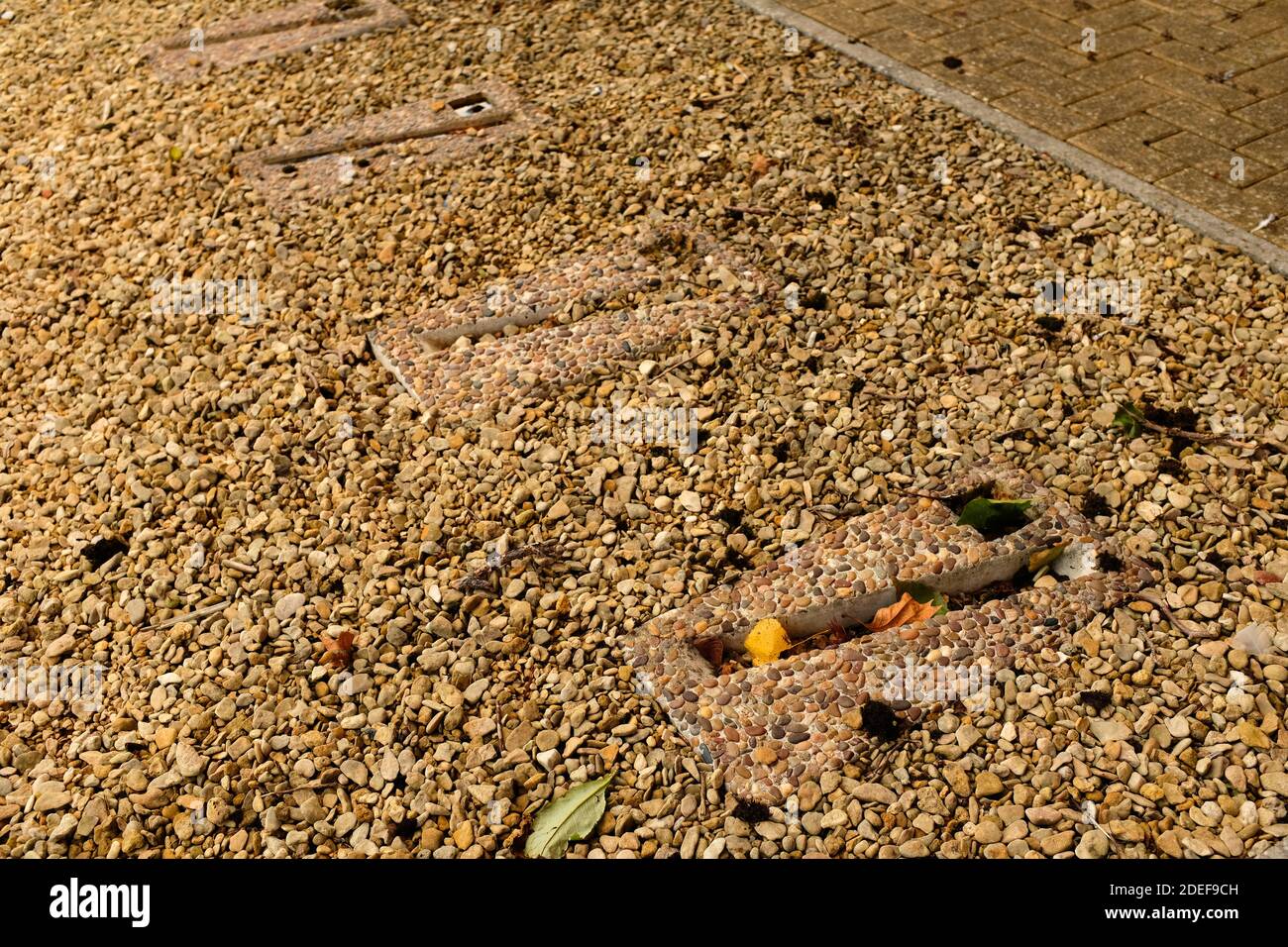 October 2020 - Bicycle parking slots in a gravel area Stock Photo