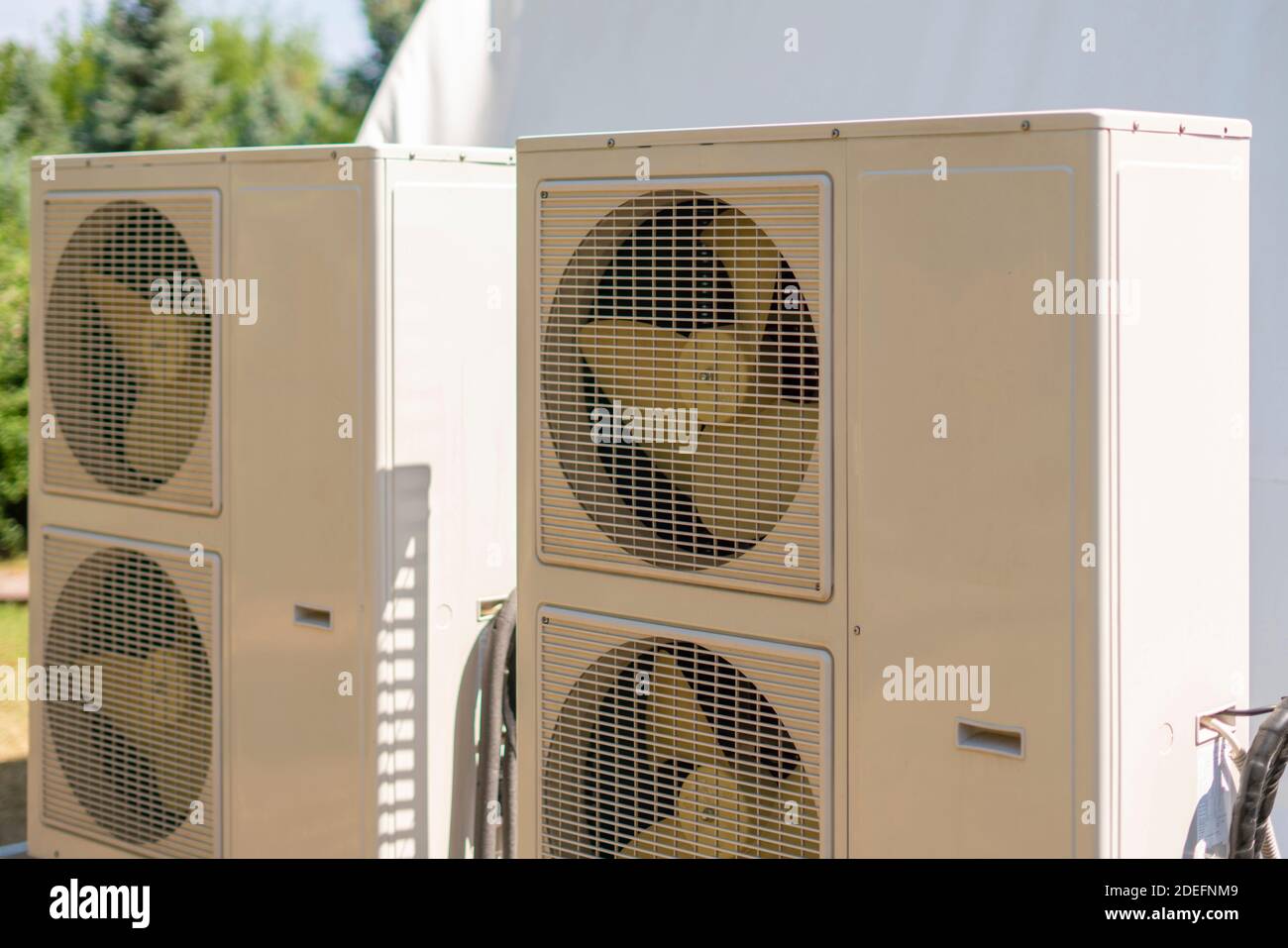 split system air conditioner unit outdoors with air cleaning equipment