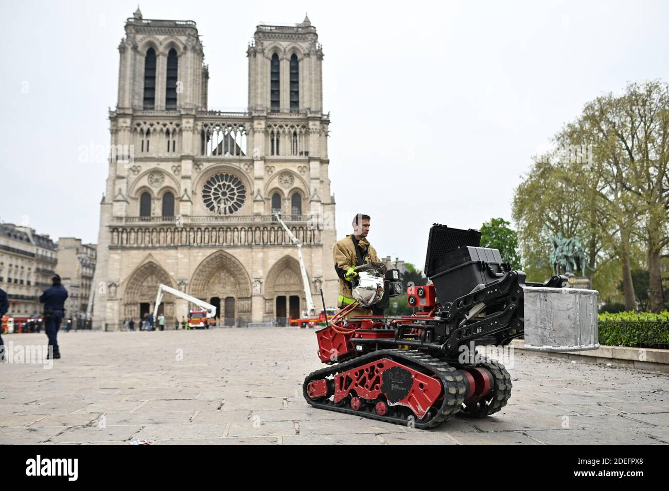 A robot belongs to Paris Fire Brigade is seen outside the Notre-Dame-de  Paris in the aftermath of a fire that devastated the cathedral in Paris,  France on April 16, 2019. A raging