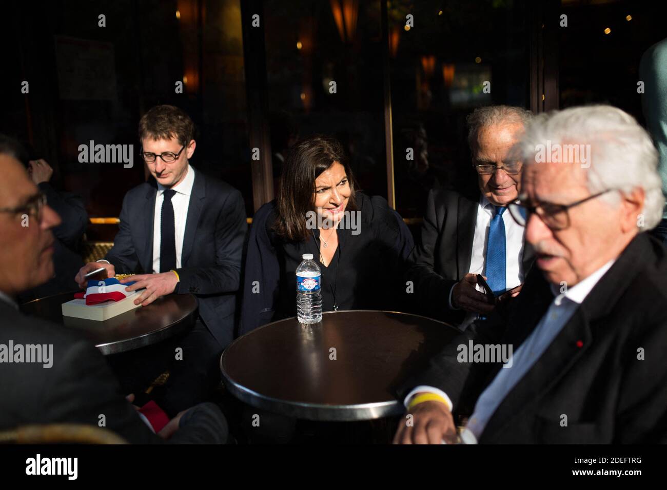 Anne Hidalgo stop to have a drink in a bar front of Notre Dame cathedral on April 18, 2019 in Paris. France paid a daylong tribute on April 18, 2019 to the Paris firefighters who saved Notre Dame Cathedral from collapse, while construction workers rushed to secure an area above one of the church's famed rose-shaped windows and other vulnerable sections of the fire-damaged landmark. Photo by Raphael Lafargue/ABACAPRESS.COM Stock Photo