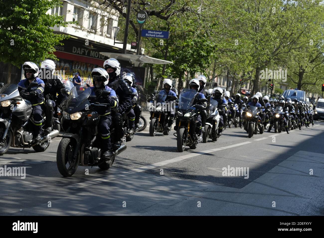 French Police special unit riding on motorcycles in a line during an  anti-government demonstration called by the "yellow vests" (gilets jaunes)  movement in Paris during the 'Act XXIII' demonstration the 23th consecutive