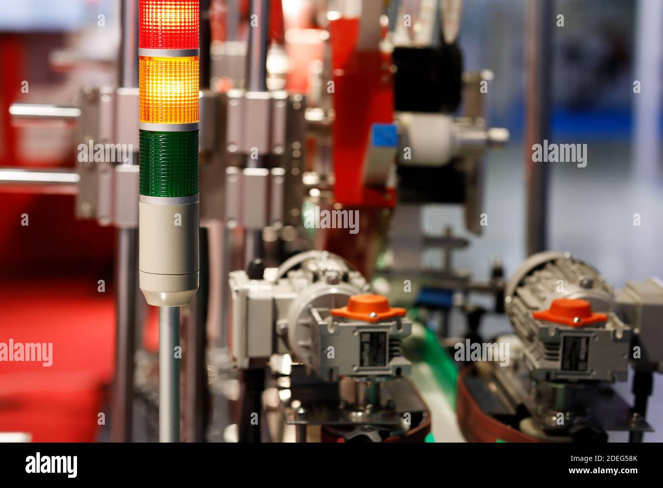 Industrial tower signal lights indicate the error status of the production line. Selective focus. Stock Photo