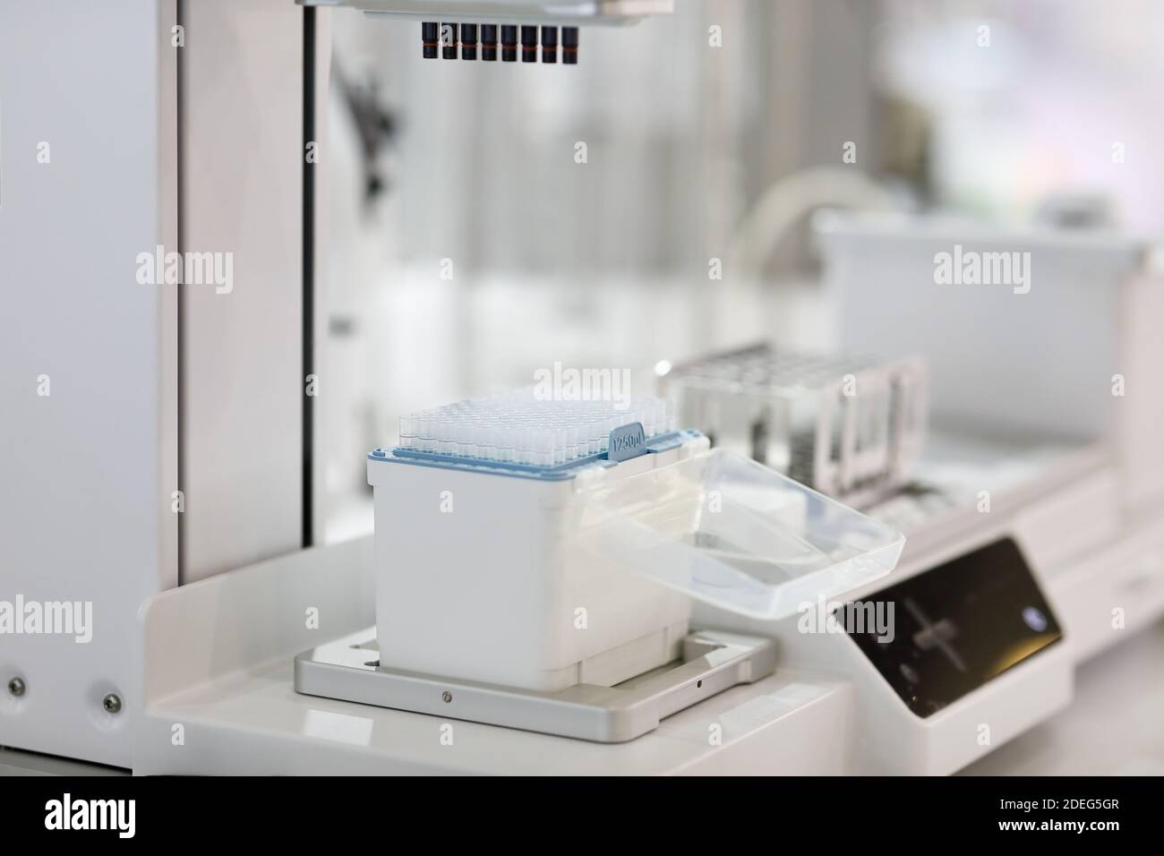 Multichannel pipetting equipment in a laboratory. Selective focus. Stock Photo