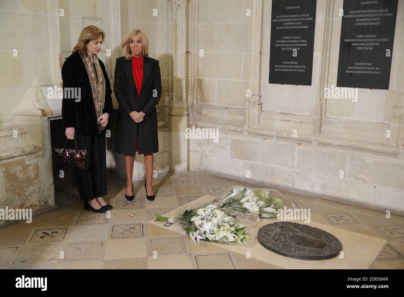 Brigitte Macron, wife of French President Emmanuel Macron, and Laura Mattarella, daughter of Italian President Sergio Mattarella pay their respects at the tomb of Italian renaissance painter and scientist Leonardo da Vinci to commemorate the 500th anniversary of his death, at the Saint-Hubert Chapel during a visit at the Chateau d'Amboise, France, May 2, 2019. Photo by Philippe Wojazer/pool/ABACAPRESS.COM Stock Photo