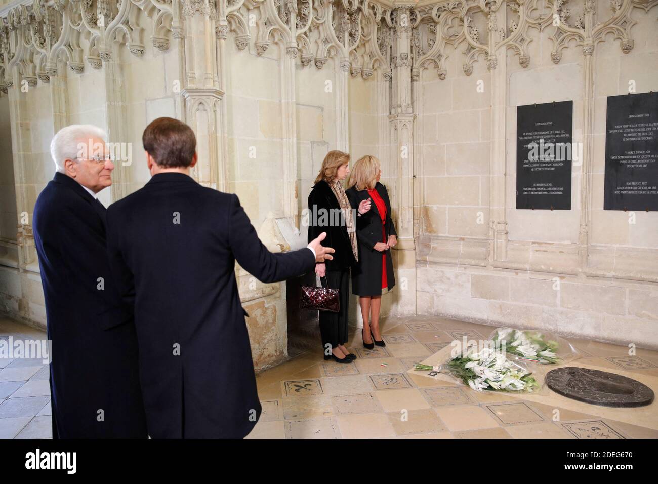 French President Emmanuel Macron, his wife Brigitte Macron, Italian President Sergio Mattarella and his daughter Laura Mattarella pay their respects at the tomb of Italian renaissance painter and scientist Leonardo da Vinci to commemorate the 500th anniversary of his death, at the Saint-Hubert Chapel during a visit at the Chateau d'Amboise, France, May 2, 2019. Photo by Philippe Wojazer/pool/ABACAPRESS.COM Stock Photo