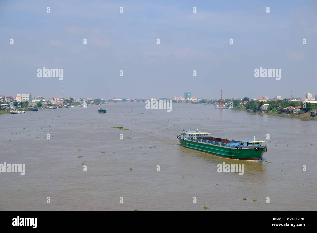 Cambodia Phnom Penh - Tonle Sap River with cargo ships Stock Photo