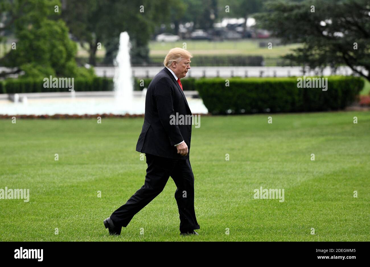 U.S. President Donald Trump walks back to the Oval Office after ...