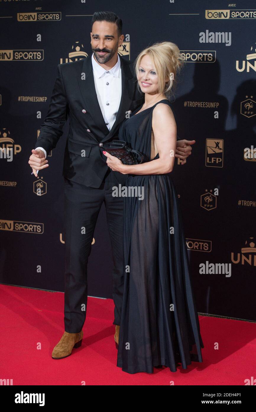 Adil rami pamela anderson hi-res stock photography and images - Alamy