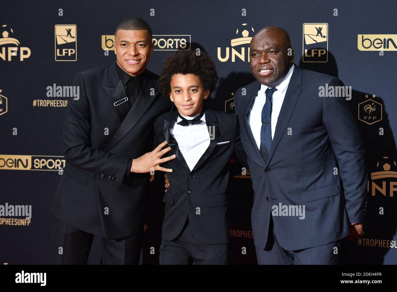 kylian mbappe and his brother ethan and his father attending the ceremony for the unfp trophy awards at pavillon d hermenonville in paris france on may 19 2019 photo laurent zabulon abacapress com stock photo