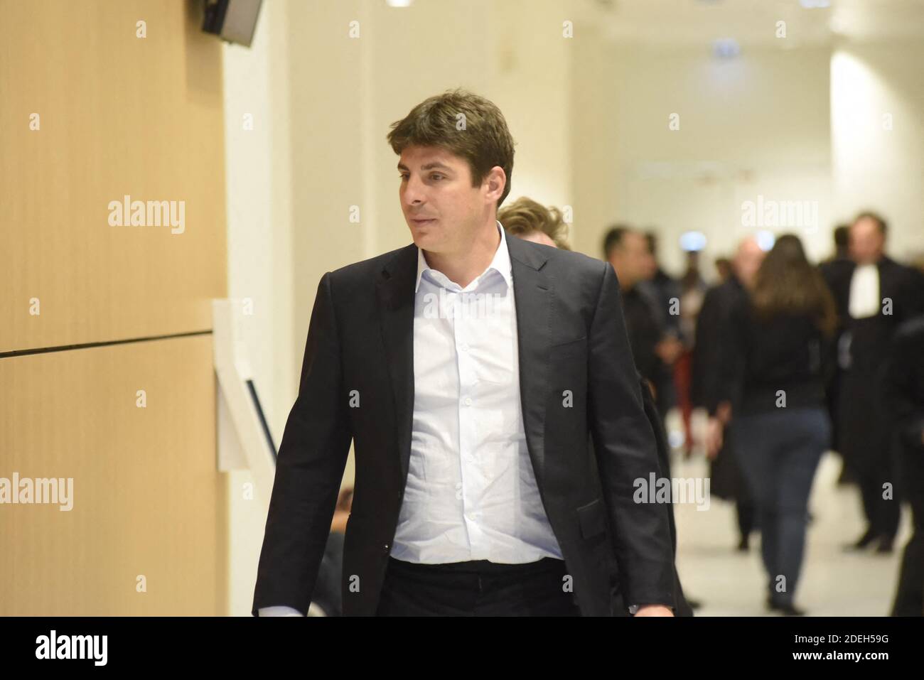 Alexandre Balkany son of Isabelle and Patrick Balkany mayor and deputy mayor of Levallois Perret Hauts de Seine followed by the French lawyer Antoine Vey arrives at Paris courthouse on May 20 2019 at ...