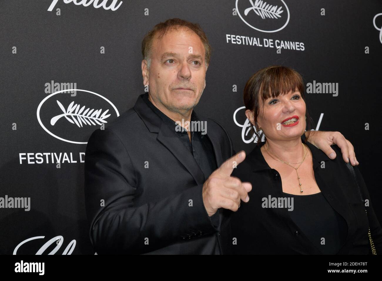 Enki Bilal and wife attending the Chopard Trophy at Agora