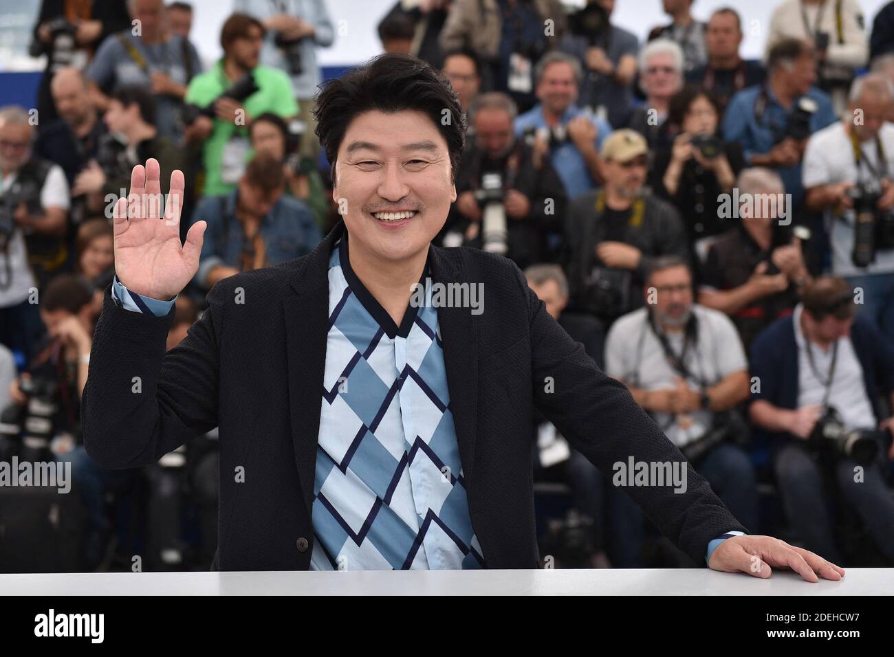 Song Kang-ho attends the photocall for 'Parasite' during the 72nd annual Cannes Film Festival on May 22, 2019 in Cannes, France Stock Photo