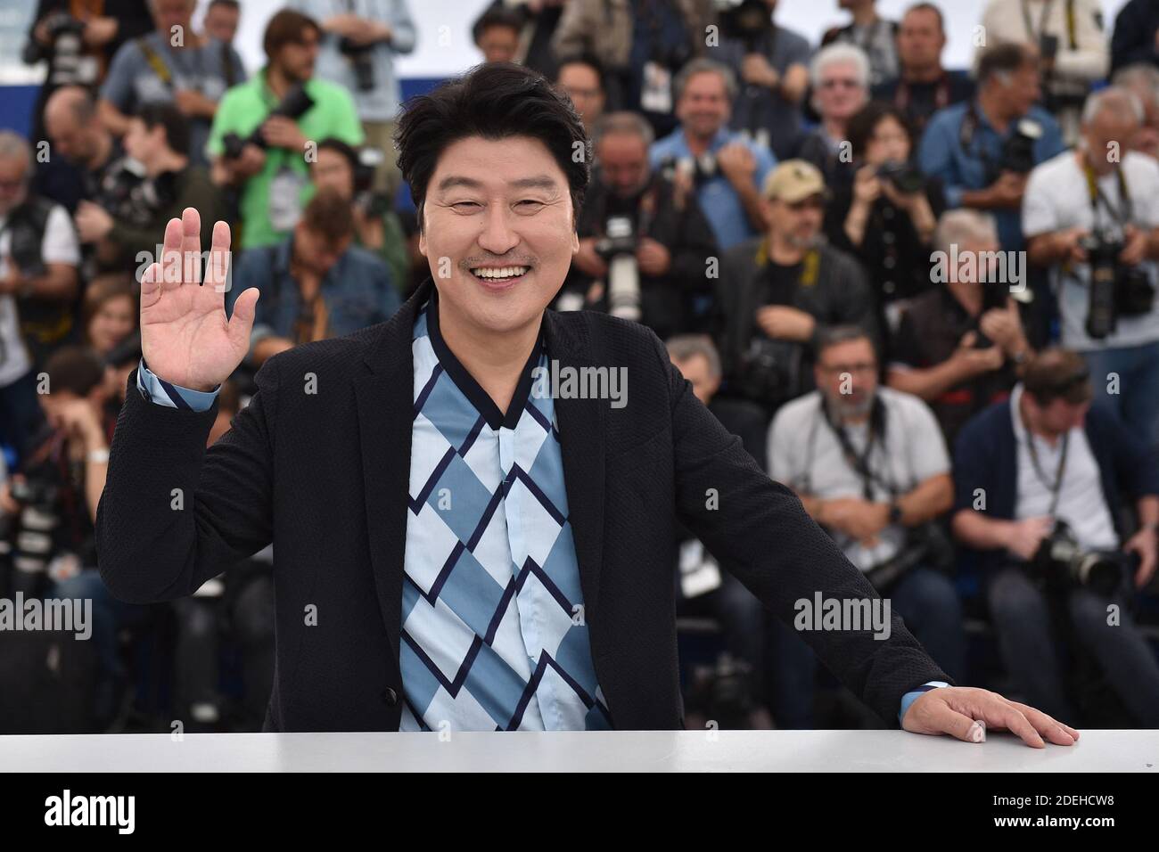 Song Kang-ho attends the photocall for 'Parasite' during the 72nd annual Cannes Film Festival on May 22, 2019 in Cannes, France Stock Photo