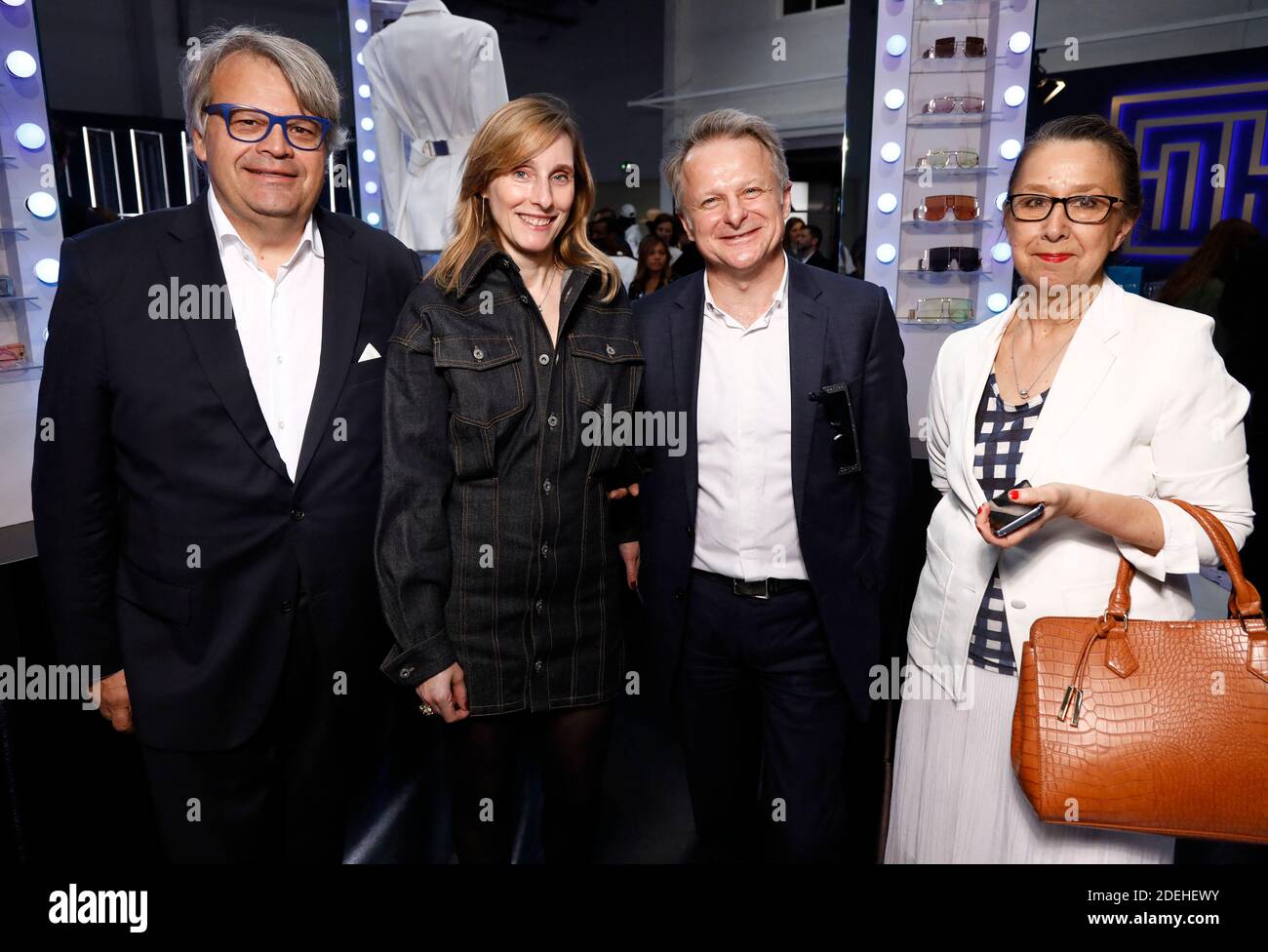 Handout - Chief Strategy Officer of LVMH and FENTY CEO, Jean-Baptiste  Voisin (2-L) attends Fenty