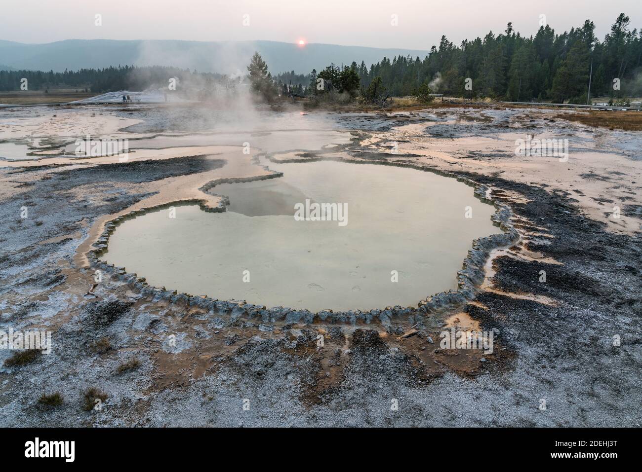 The Doublet Pool is an intermittant clearwater hot spring on Geyser HIll in the Upper Geyser Basin, Yellowstone Nationla Park, Wyoming, USA. Stock Photo