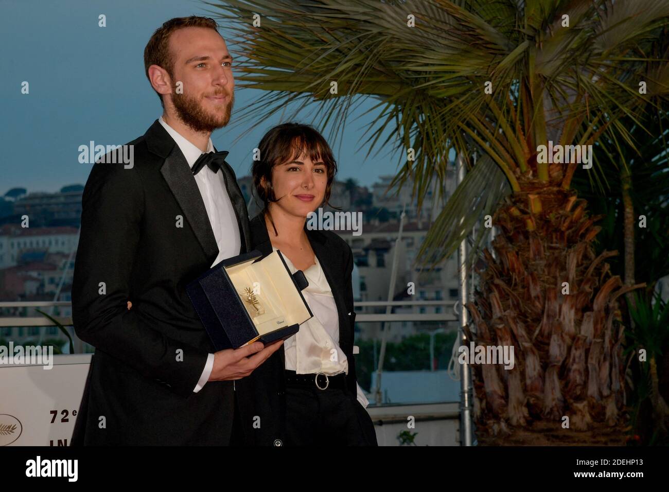Vasilis Kekatos winner of the Best Short Film award for The Distance  Between Us and The Sky, and Agustina San Martín attending the Winners  photocall during the 72nd Cannes Film Festival in