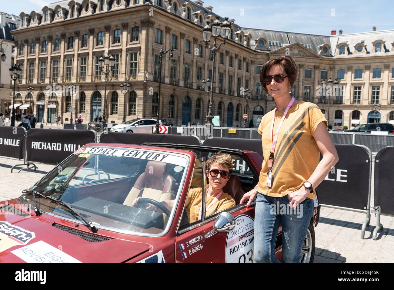 Stephanie Navalon (in car) and Delphine Dupre) drive a 1979 Fiat X1/9 on the 20th edition of the Rallye des Princesses 'Princesses' Rally', a 5 days motorrace for women only on vintage cars, starts on June 2nd from Paris to reach Saint Tropez on June 6th. Teams register and present the cars on the 1st of June on Place Vendôme, Paris, France, June 1st 2019. Photo by Daniel Derajinski/ABACAPRESS.COM Stock Photo