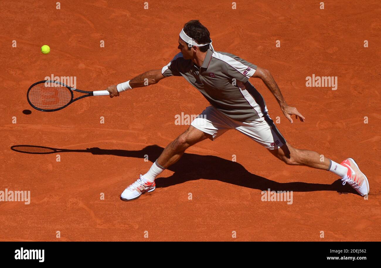 Roger Federer of Switzerland plays a backhand during his mens singles  fourth round match against Leonardo Mayer of Argentina during Day eight of  the 2019 French Open at Roland Garros on June