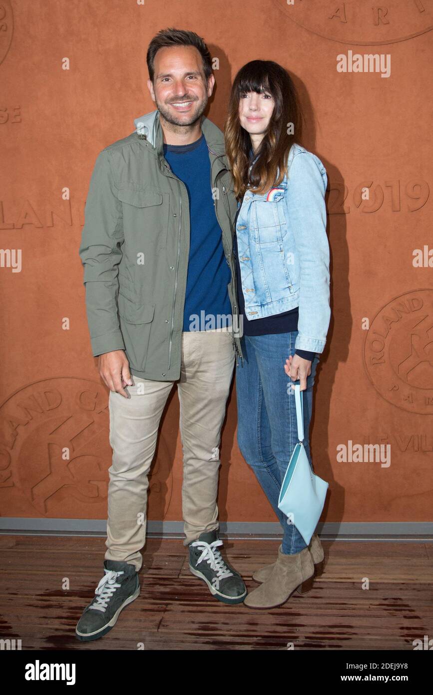 Christophe Michalak and his wife Delphine McCarty in village during
