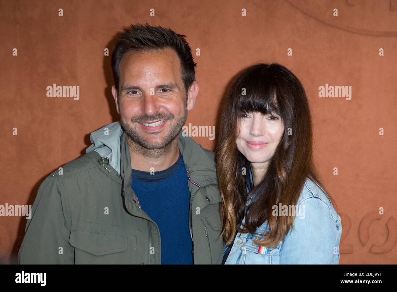 Christophe Michalak and his wife Delphine McCarty in village during