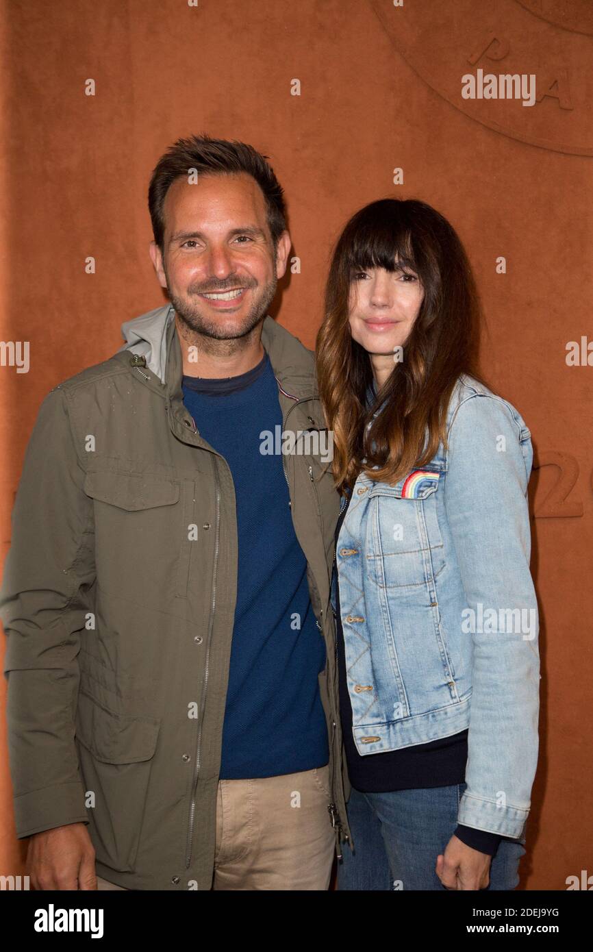Christophe Michalak and his wife Delphine McCarty in village during
