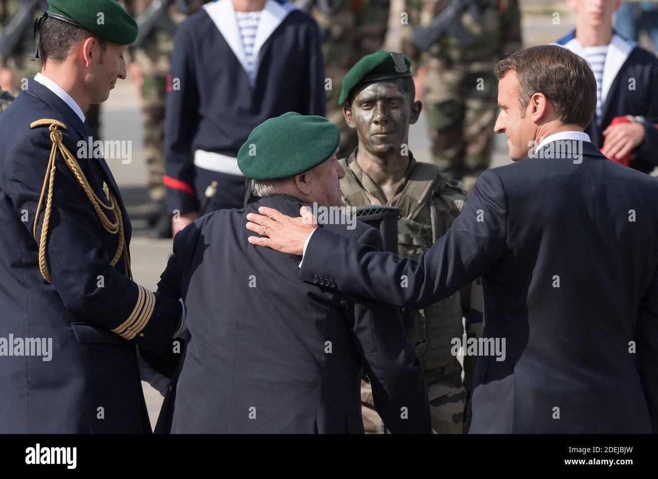 Leon Gautier, Emmanuel Macron and Marine commando (Berets Verts) attending  a ceremony to pay homage to the Kieffer commando on June 6, 2019 in  Colleville-Montgomery, Normandy. The Kieffer commando, an elite French