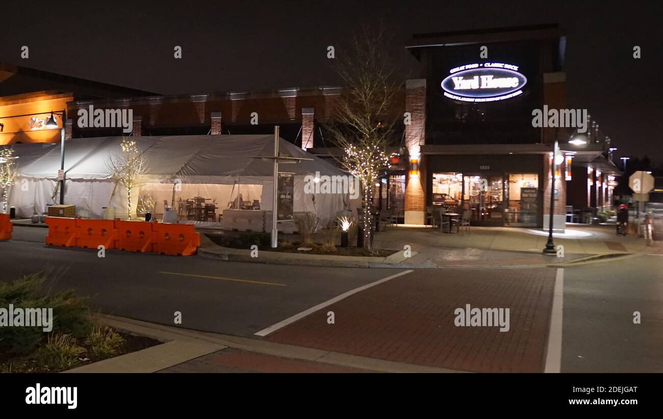 Yard House Restaurant provides heated tents for outdoor seating due to Illinois' indoor dining restrictions. Stock Photo