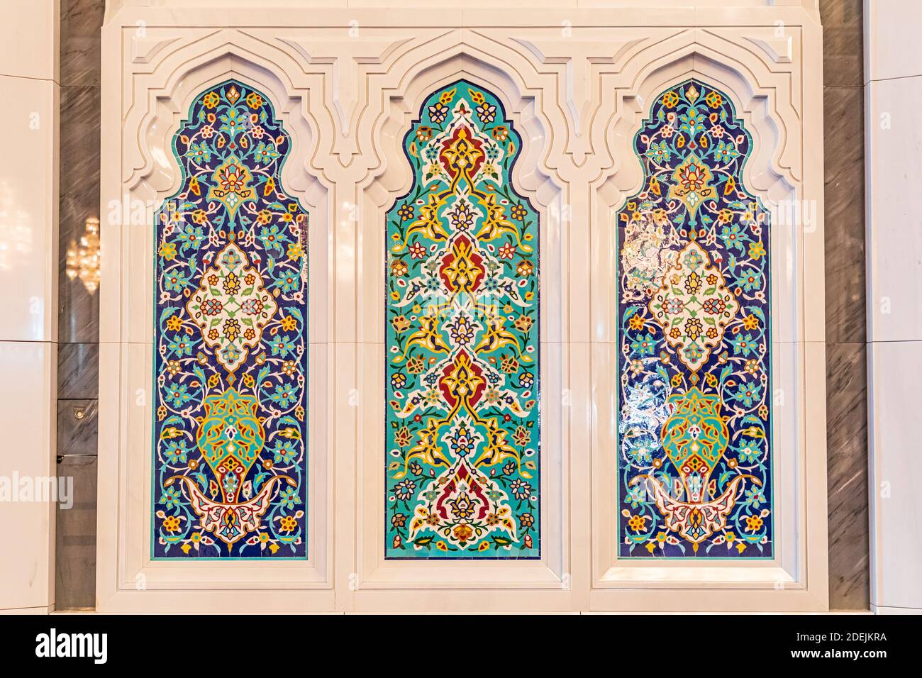 Middle East, Arabian Peninsula, Oman, Muscat. Decorative windows in the Sultan Qaboos Grand Mosque in Muscat. Stock Photo