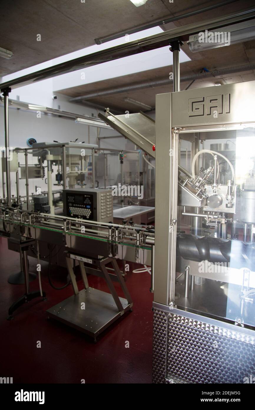 Wine bottle labeling machine Stock Photo Alamy