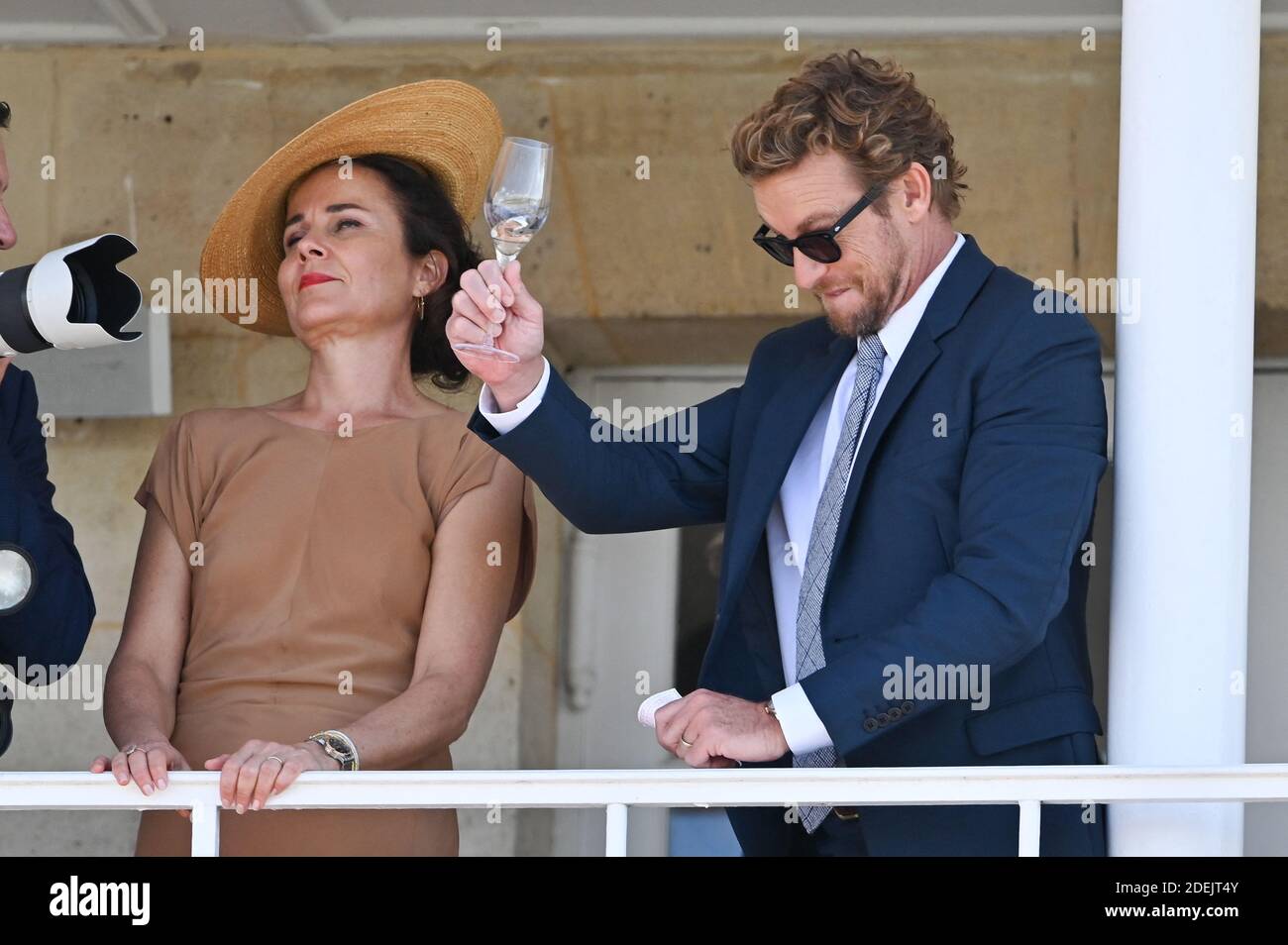 Actor Simon Baker and his wife Rebecca Rigg attend the Prix De Diane ...