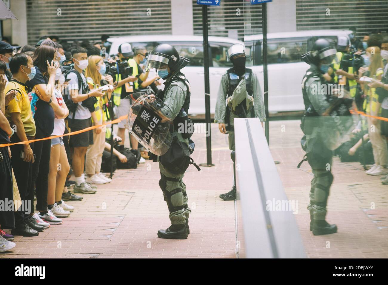 Hong Kong, 27 May 2020, protesters are arrested by police as illegal assembly in Causeway Bay. People are wearing mask as covid 19 prevention control. Stock Photo