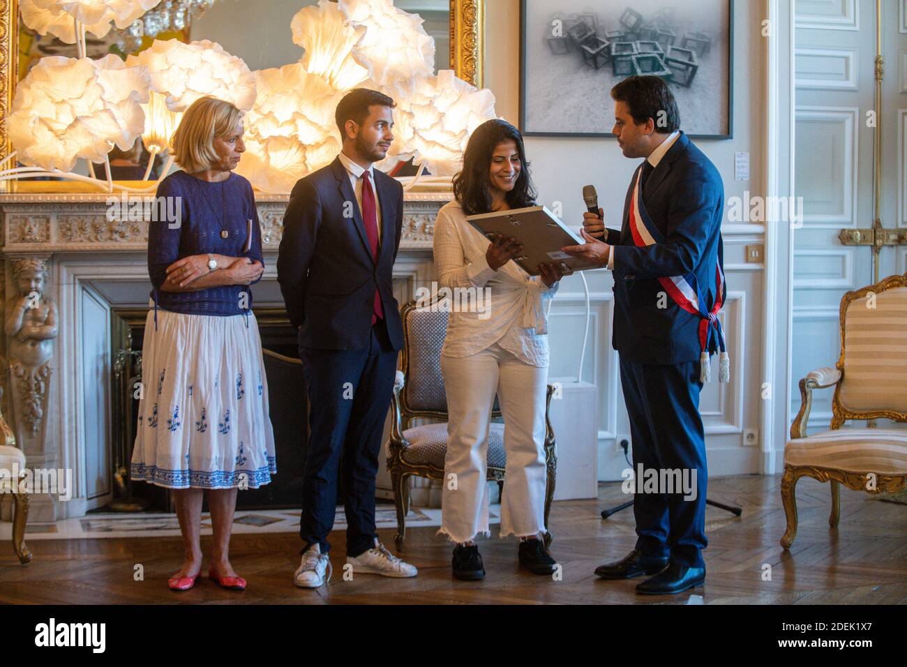 L-R : Genevieve Garrigos (Amnesty International), Omar Didi (MAG), Lina Al Hathloul receives honorary citizenship for her sister, jailed Saudi activist Loujain Al Hathloul from Paris Mayor Deputy Patrick Klugman at Hotel de Ville or City Hall, in Paris, France on June 21, 2019. Photo by Balkis Press/ABACAPRESS.COM Stock Photo