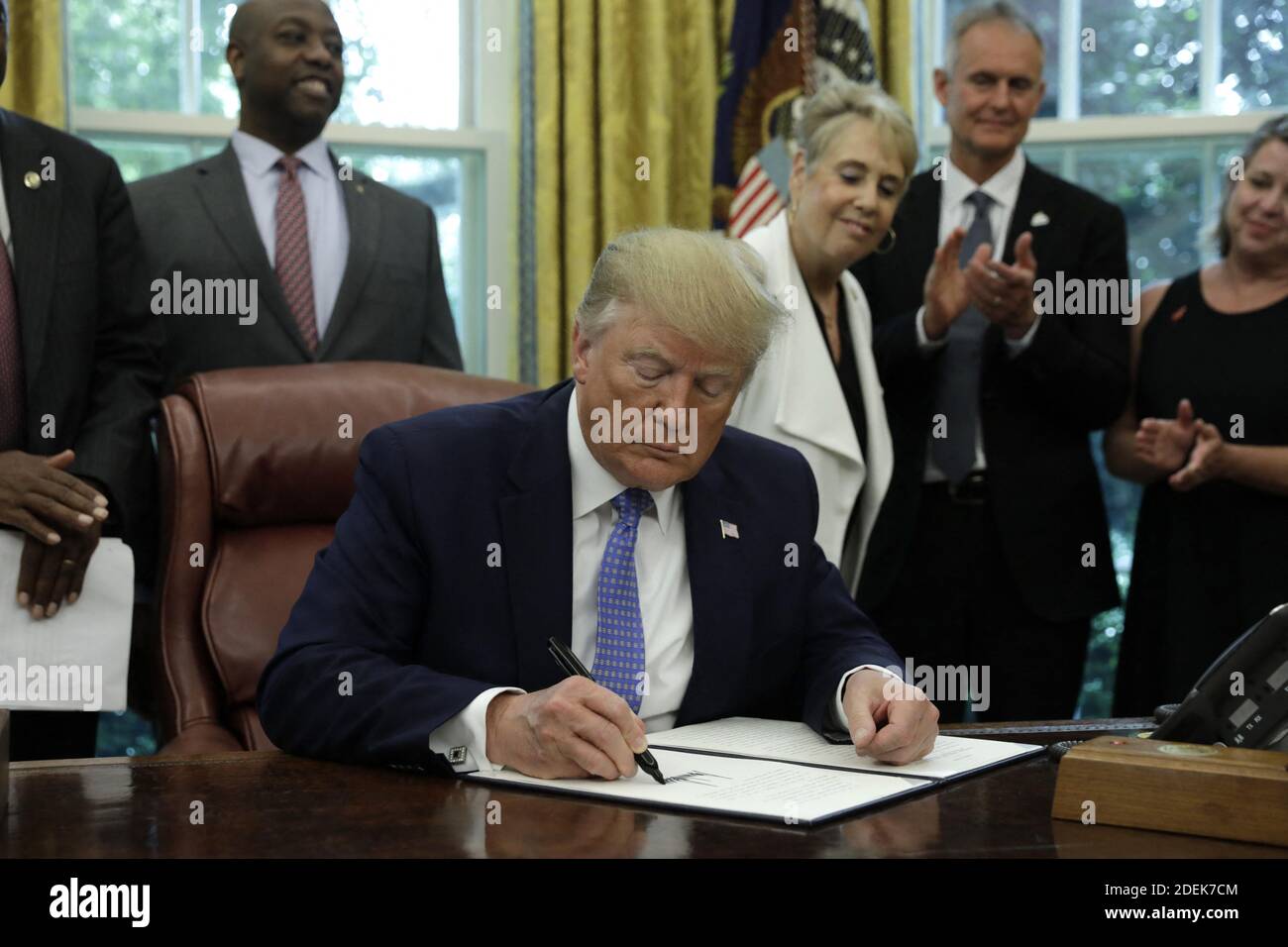 US President Donald Trump signs an Executive Order Establishing a White House Council on Eliminating Regulatory Barriers to Affordable Housing in the Oval Office at the White House in Washington, D.C., on June 25, 2019. Photo by Yuri Gripas/Pool/ABACAPRESS.COM Stock Photo