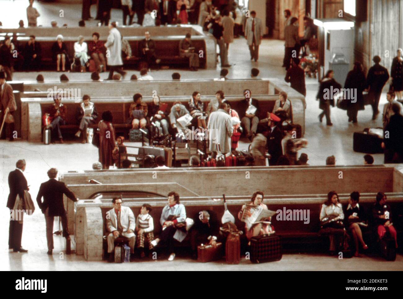 Train passengers in the main hall of the 30th Street station at