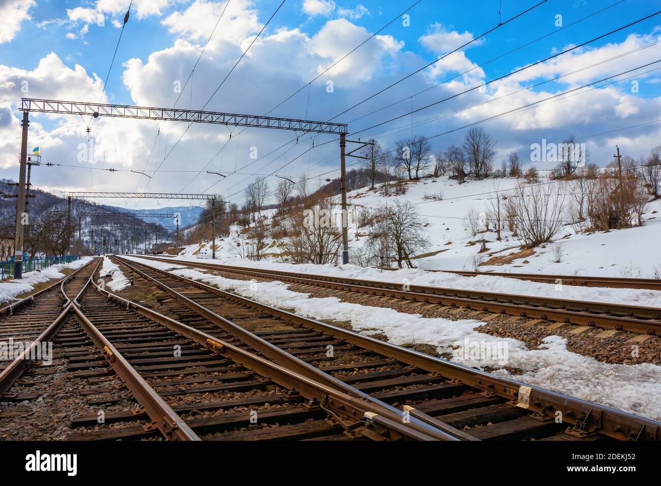 railway station in mountains. frosty winter landscape. transportation scenery Stock Photo