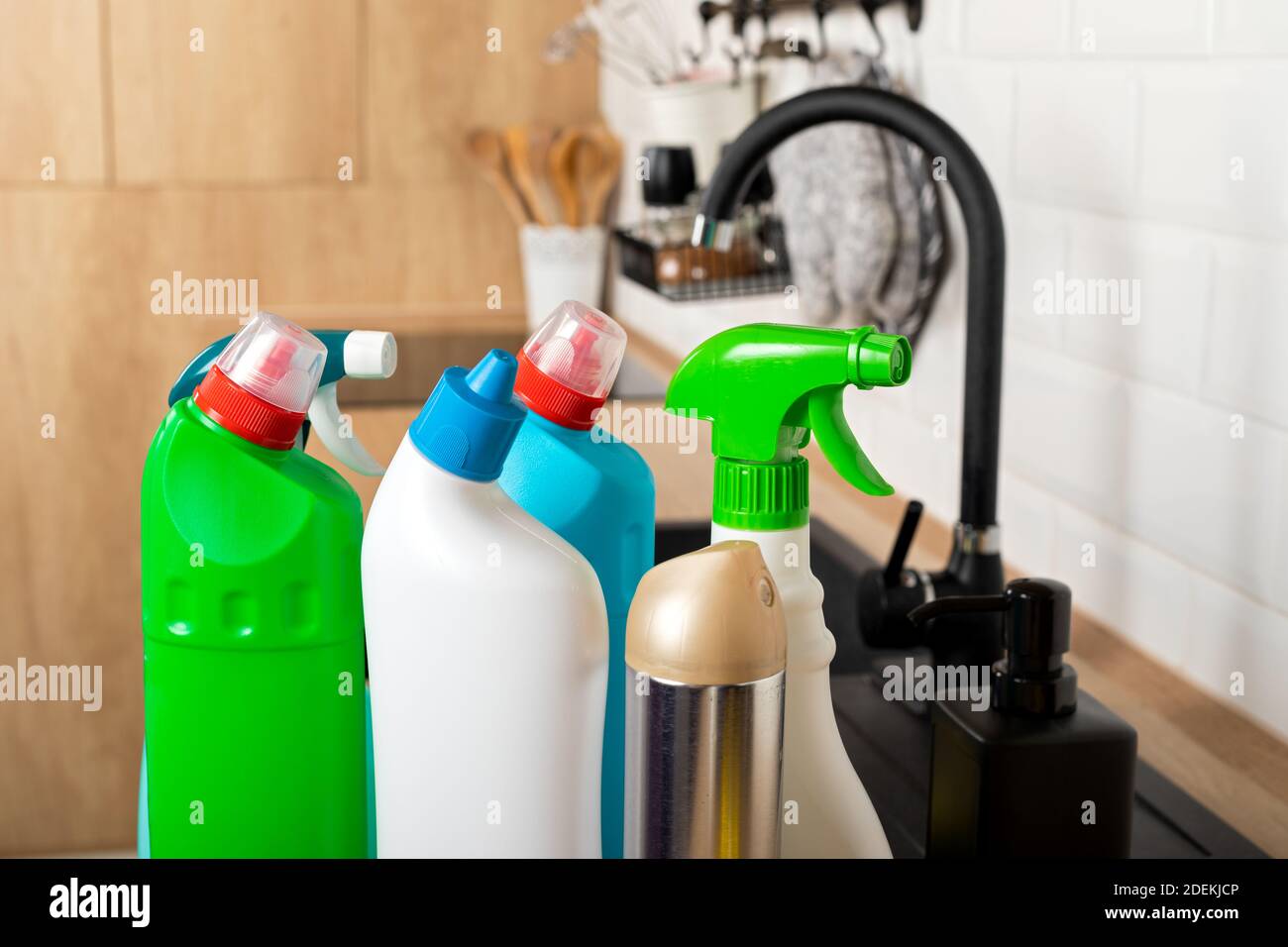 Colorful cleaning products in the kitchen Stock Photo Alamy