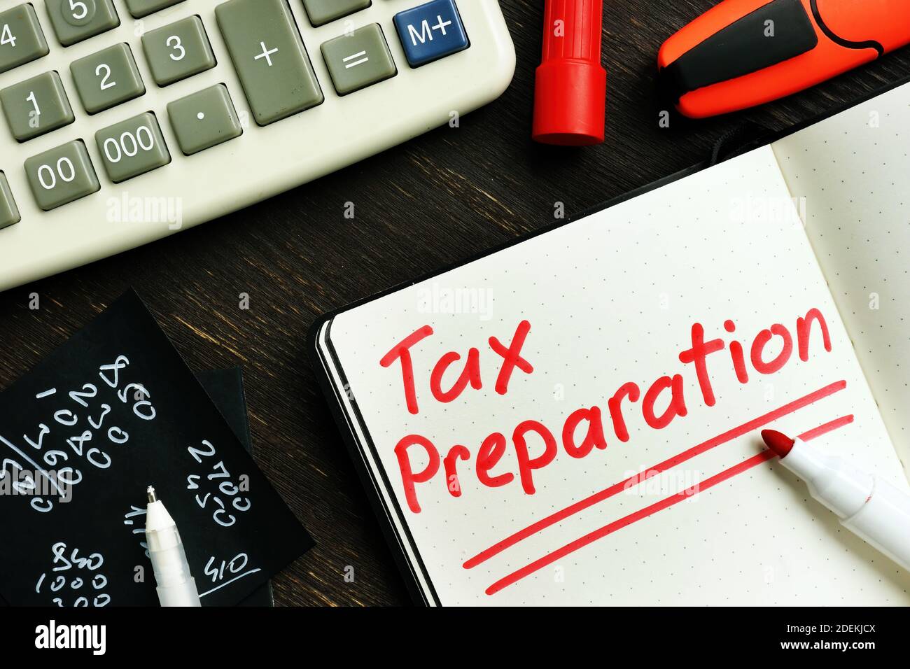 Tax preparation memo on the page of notepad by marker. Stock Photo