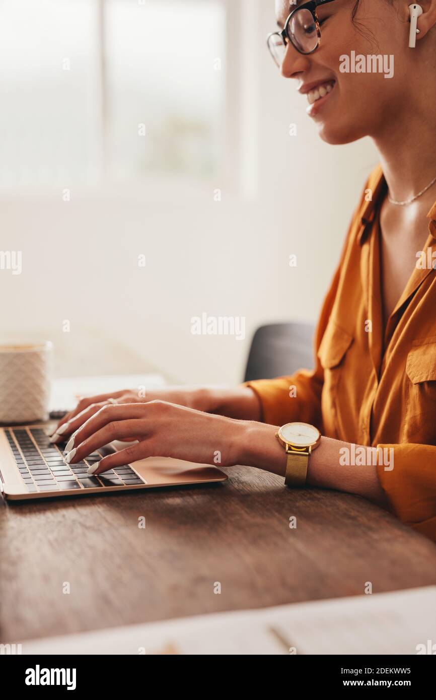 Female working writing hi-res stock photography and images - Alamy