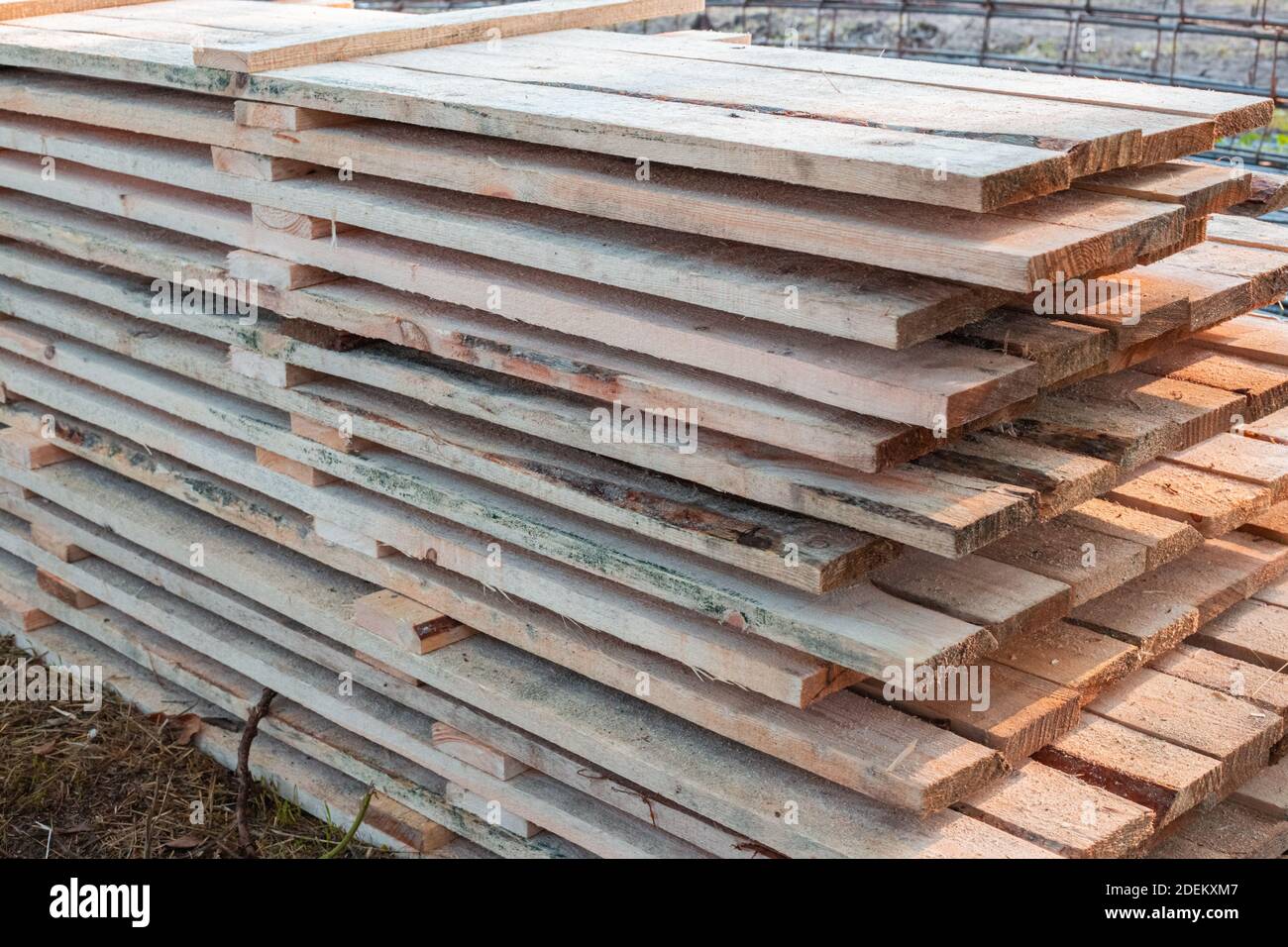 wooden planks hammered into formwork panels for construction, neatly folded Stock Photo Alamy