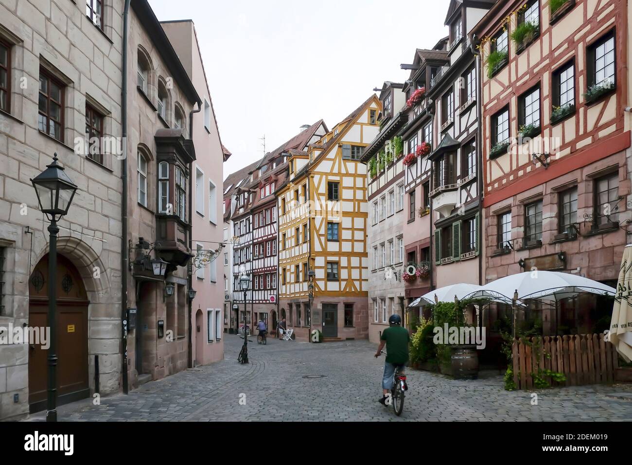 Old Bavarian city with cobbled stone streets and traditional houses. Nurnberg is second-largest city in Bavaria, popul. Stock Photo