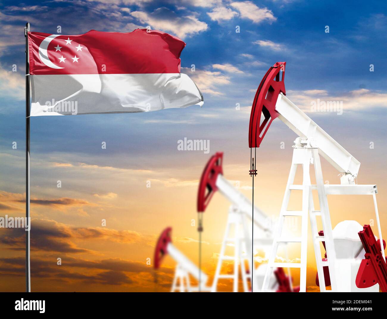 Sg Oil Rig Oil rigs against the backdrop of the colorful sky and a flagpole with ...
