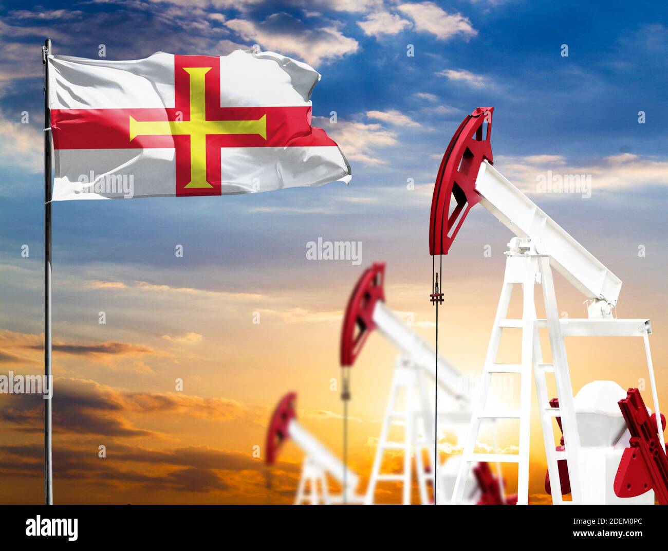 Oil rigs against the backdrop of the colorful sky and a flagpole with