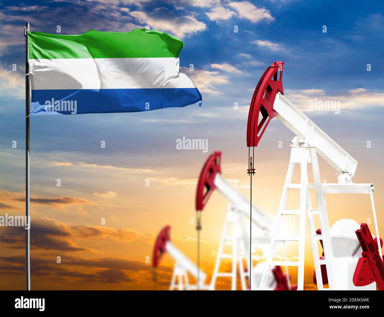 Leon Rig Oil rigs against the backdrop of the colorful sky and a flagpole with ...