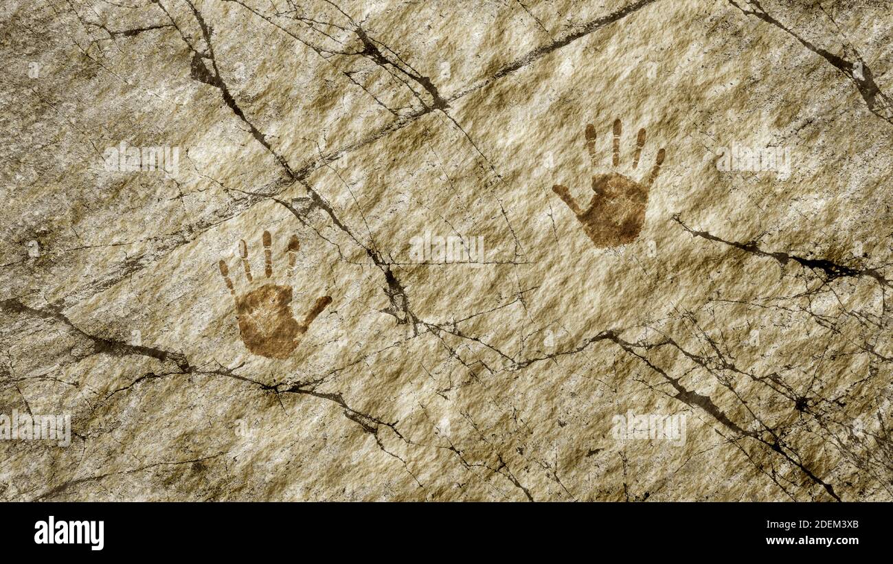 Cave painting with two hand prints concept Stock Photo