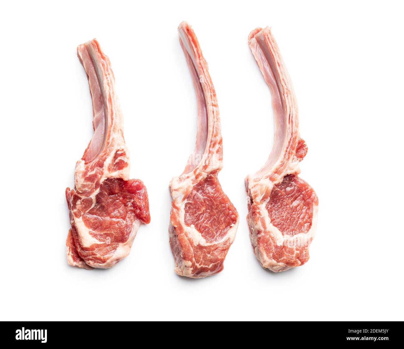 Slices raw lamb chops isolated on white background. Stock Photo