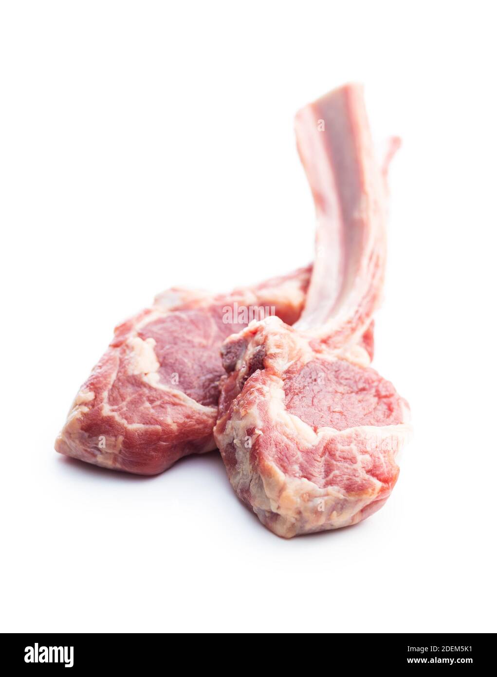 Raw lamb chops, fresh mutton meat cutlets on a ribs. Isolated on white  background Stock Photo - Alamy