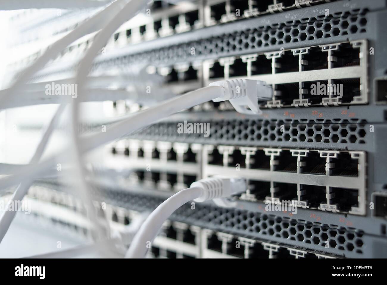 Working switches in data center with white cables Stock Photo Alamy