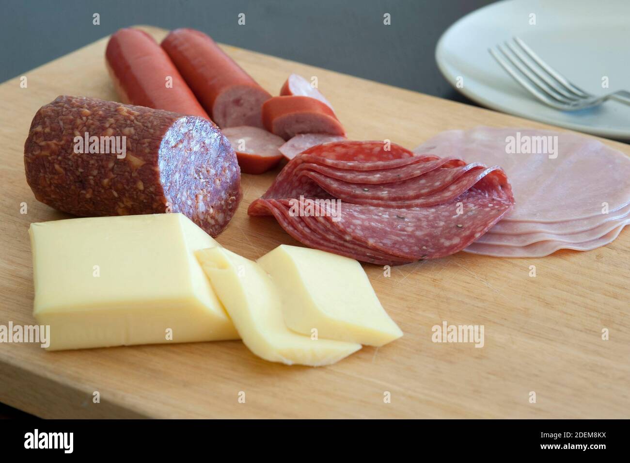 Protein rich German breakfast with sliced ham, salami and sausage and