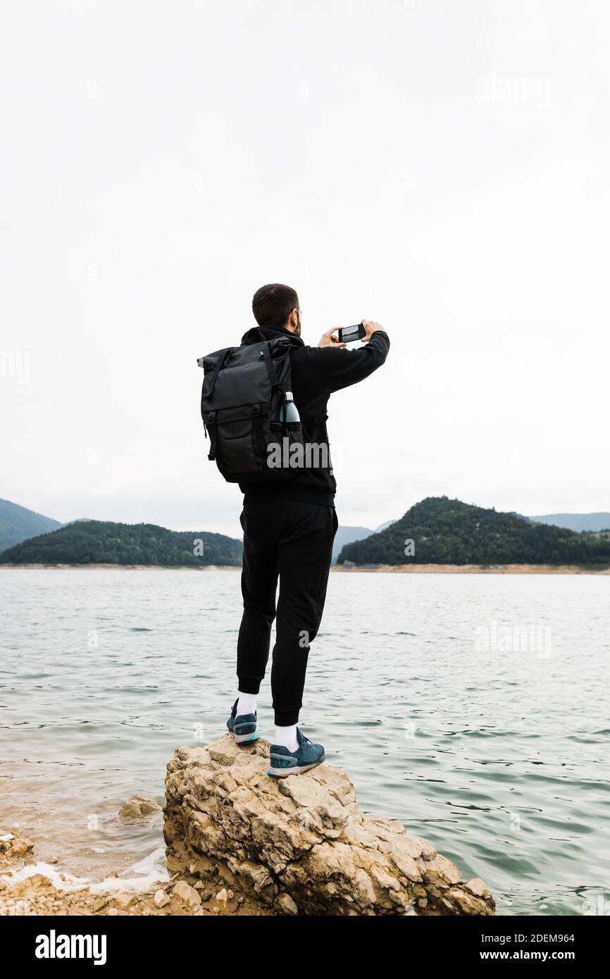 Male standing rear view outdoors hi-res stock photography and images ...
